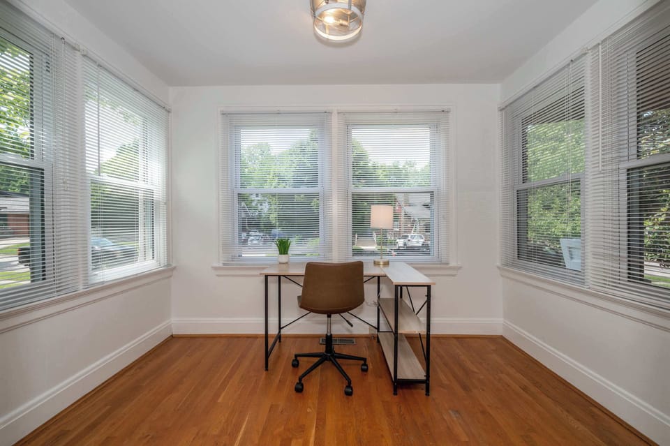 Unit 1 – The sunny office nook off the living room is a great spot for checking emails