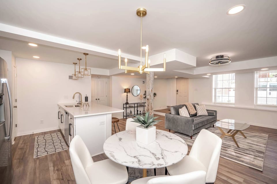 Unit 101: Enjoy seating for 4 at the table in this unit’s open dining area
