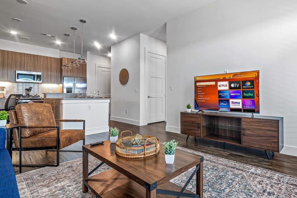 Once you enter the living room you'll find a space that feels both luxurious and cozy, perfect for unwinding after a long day.