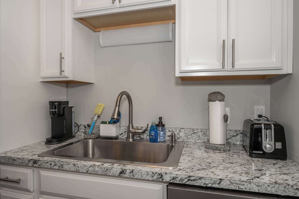 Unit 2: The well-equipped kitchen is spacious and open to the living area