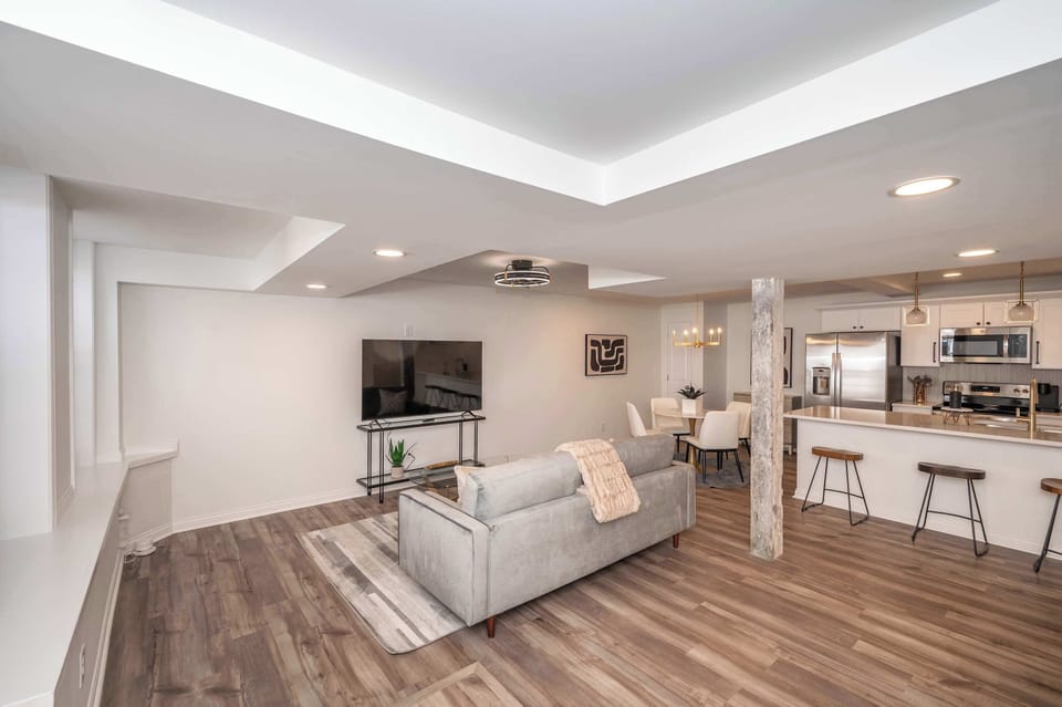This 1st floor condo boasts an open layout, fantastic amenities, and historic charm
