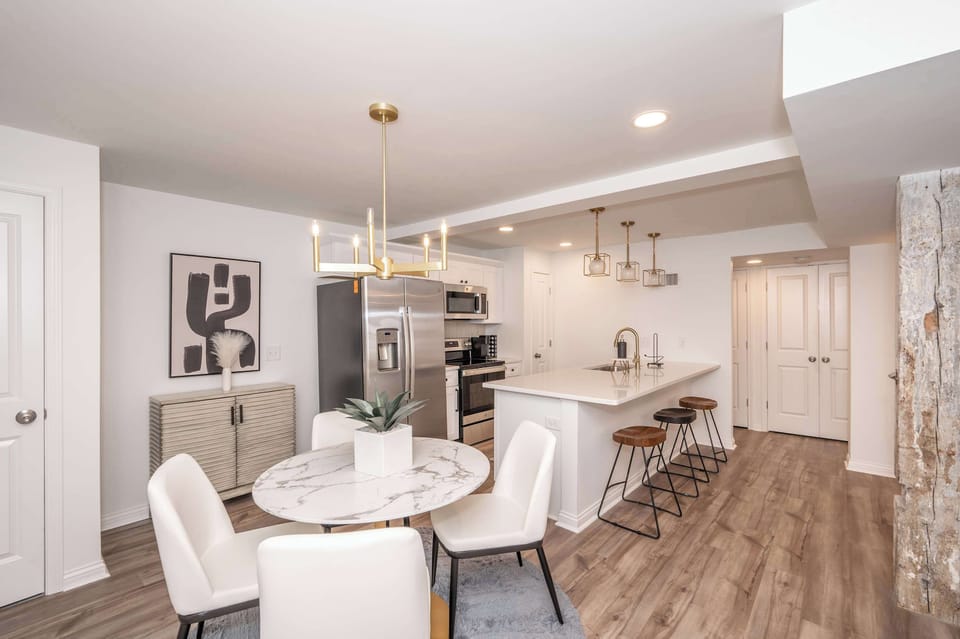 Enjoy dining seating for 4 and additional counter seating for 3 in the kitchen