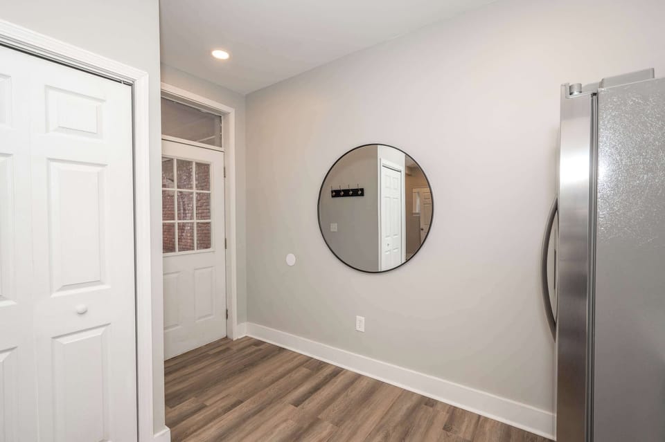 Enter this main-level condo into the sleek, updated kitchen