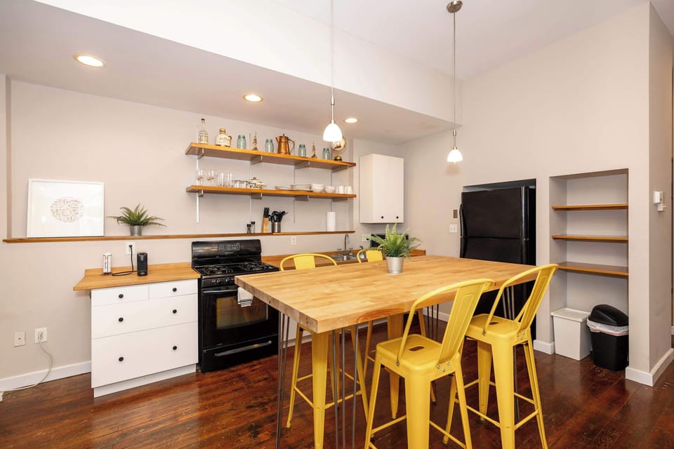 The chic eat-in kitchen offers ample space & all the comforts of home
