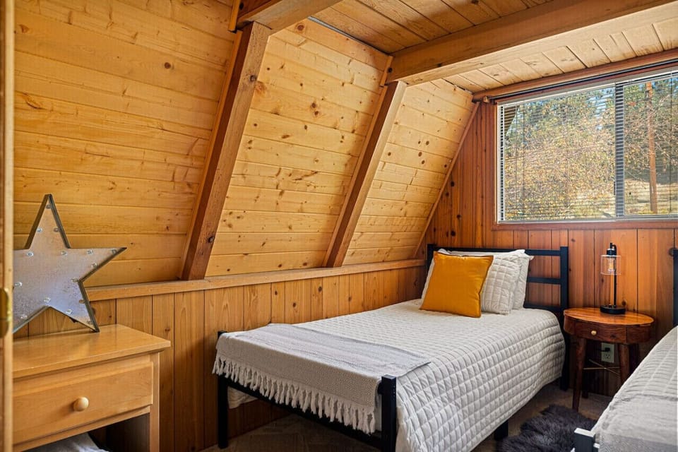 Bedroom two featuring two single beds.