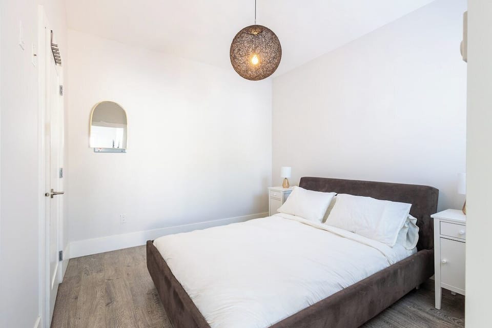 The bedroom offers a peaceful haven for a restful night's sleep, with cozy decor and soft lighting.
