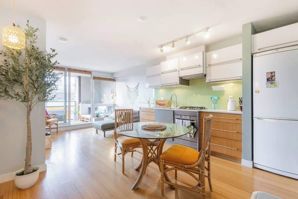 Natural light fills the room: Unwind with stylish furnishings and access to the private balcony.