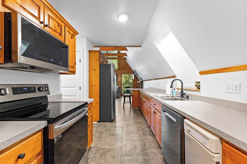 New appliances, plenty of counter space; Stocked w/ everything you need to cook.