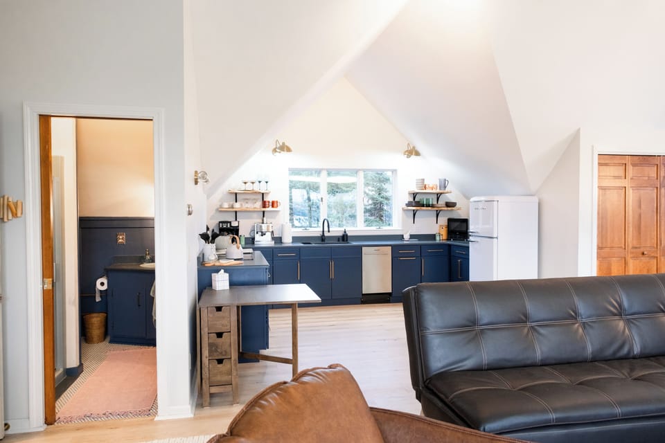 Full kitchen with pull out dining space and a private full bathroom