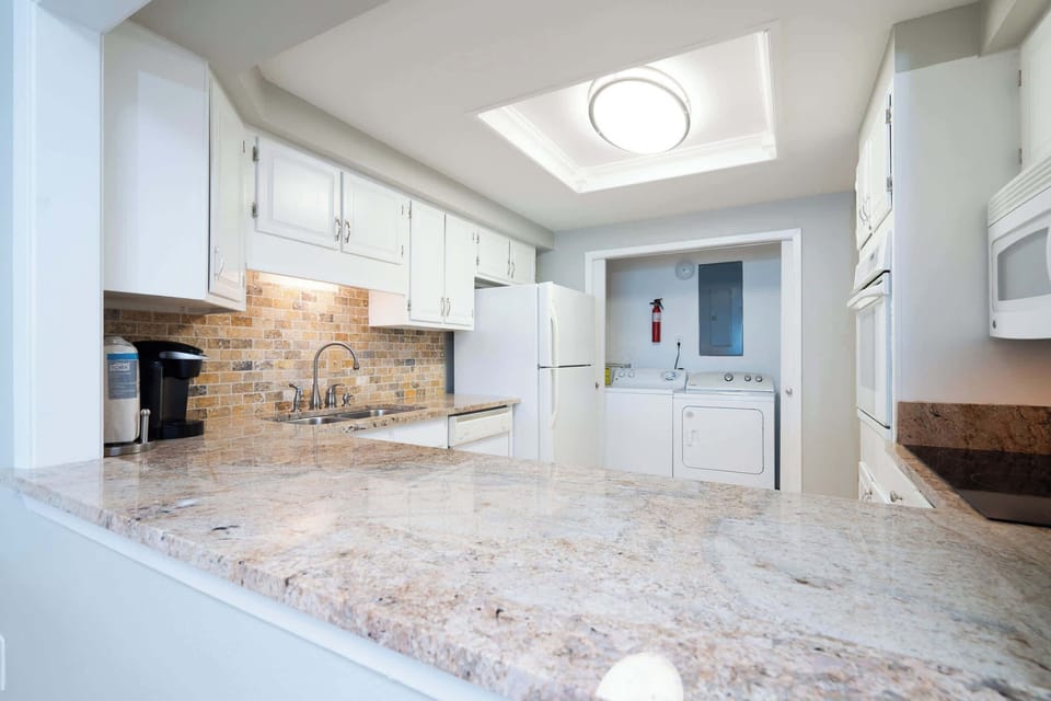 Kitchen countertop opening into the dining room