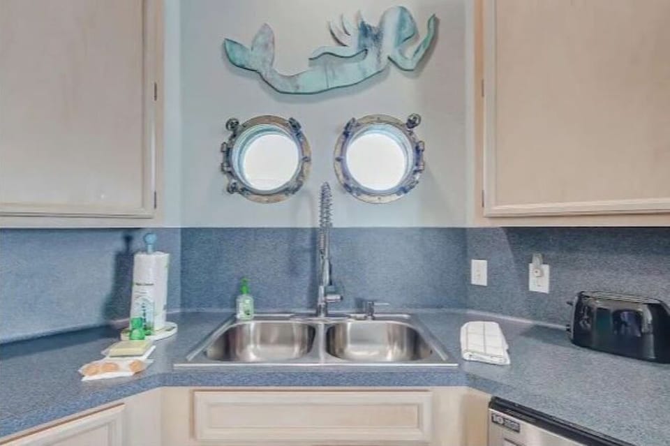 Genuine porthole windows over the sink