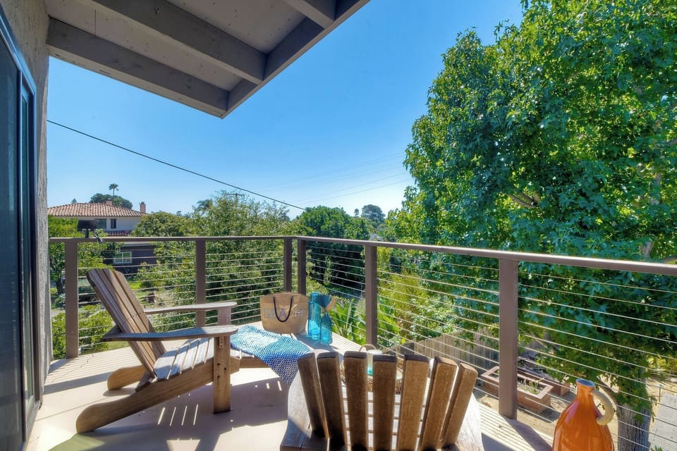 The king suite boasts a private ensuite, fireplace, Smart TV, & balcony access