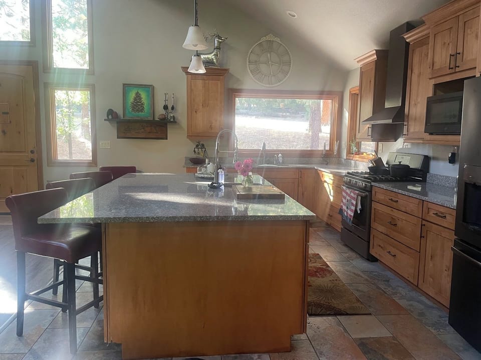 Sunny Kitchen with lots of work space and any gadget, utensil, pot,pan etc...