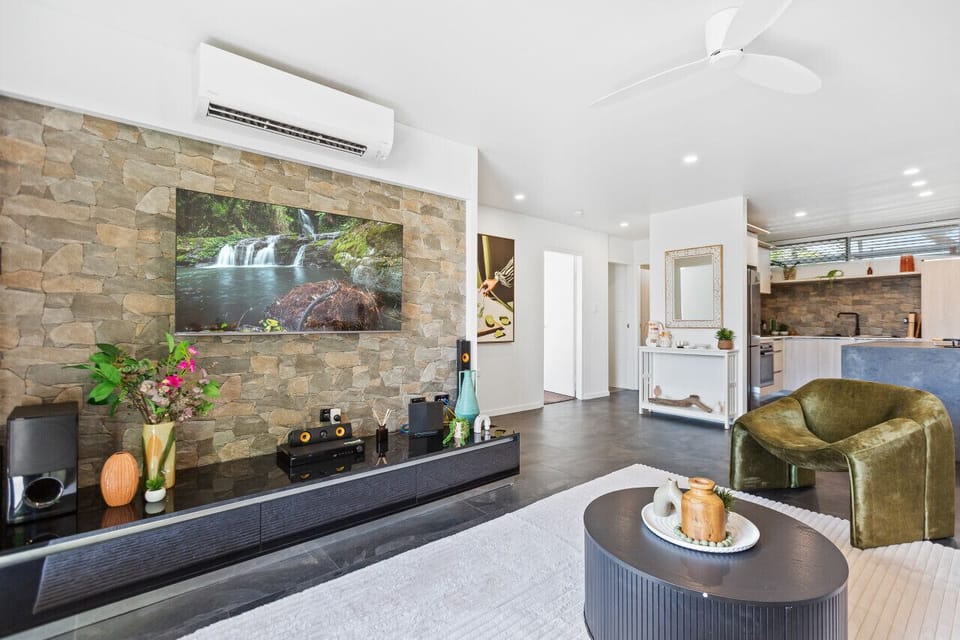 Lounge Room: Modern elegance with a stunning view, perfect for gaming or movie marathons!