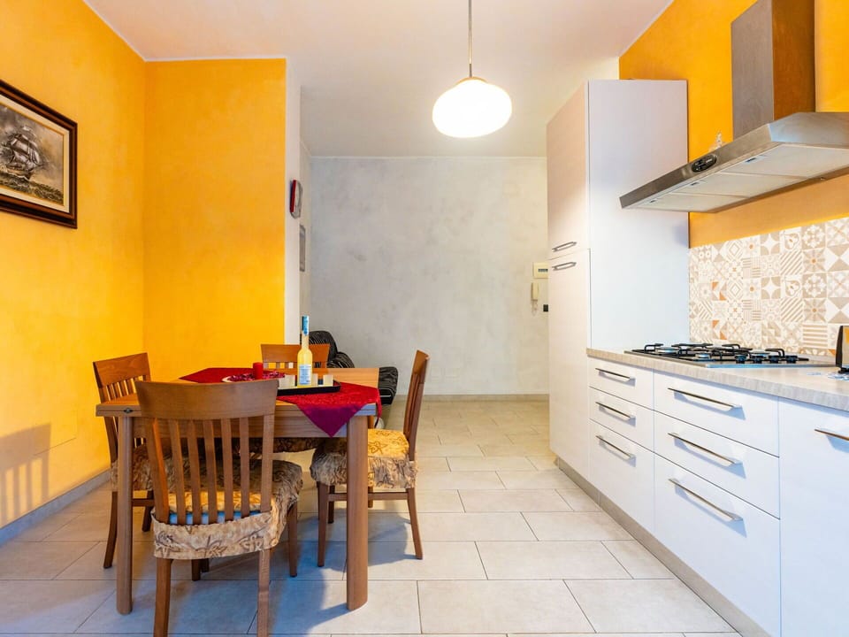 Cabinetry, Furniture, Countertop, Table, Chair, Wood, Architecture, Yellow, Drawer, Building