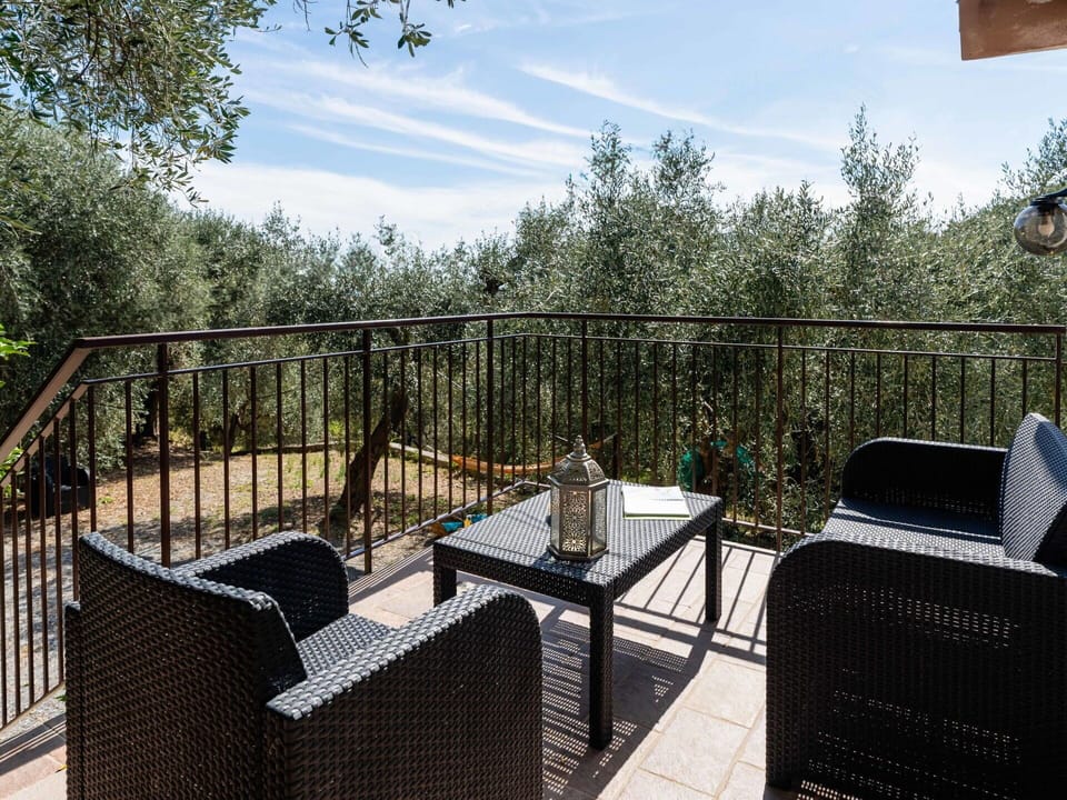 Sky, Cloud, Building, Chair, Shade, Interior Design, Outdoor Furniture, Tree, Fence, Cottage