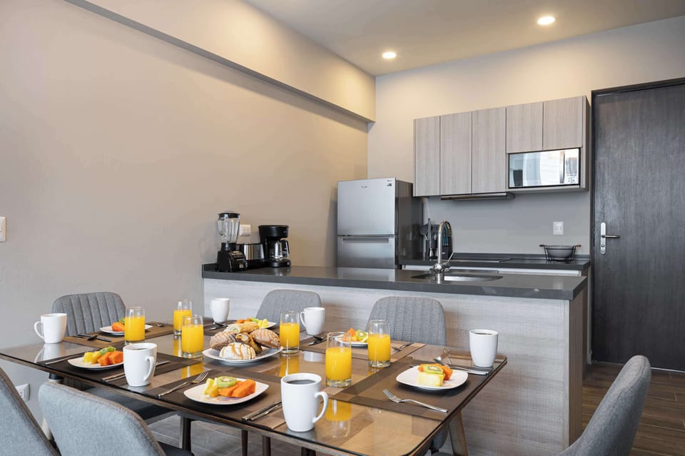 Kitchen with stainless steel appliances and ample counter space.