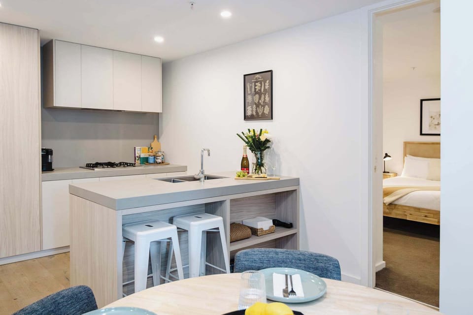 Experience effortless elegance at this sleek kitchen counter, featuring a modern sink that combines style with functionality for all your culinary adventures