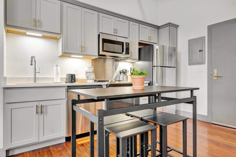 Kitchen: Spacious kitchen with updated cabinetry and modern appliances, perfect for preparing meals. 