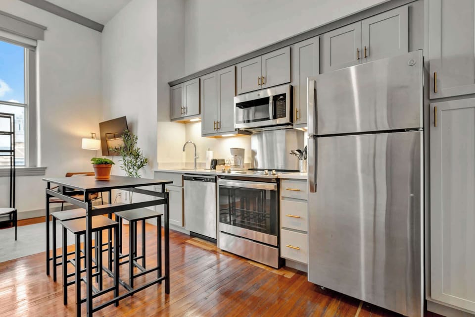 Kitchen: Spacious kitchen with updated cabinetry and modern appliances, perfect for preparing meals. 