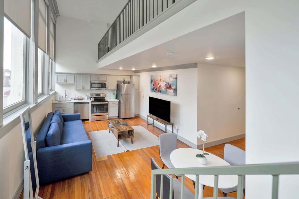 Living Room: Bright and airy living area, perfect for unwinding after a long day!