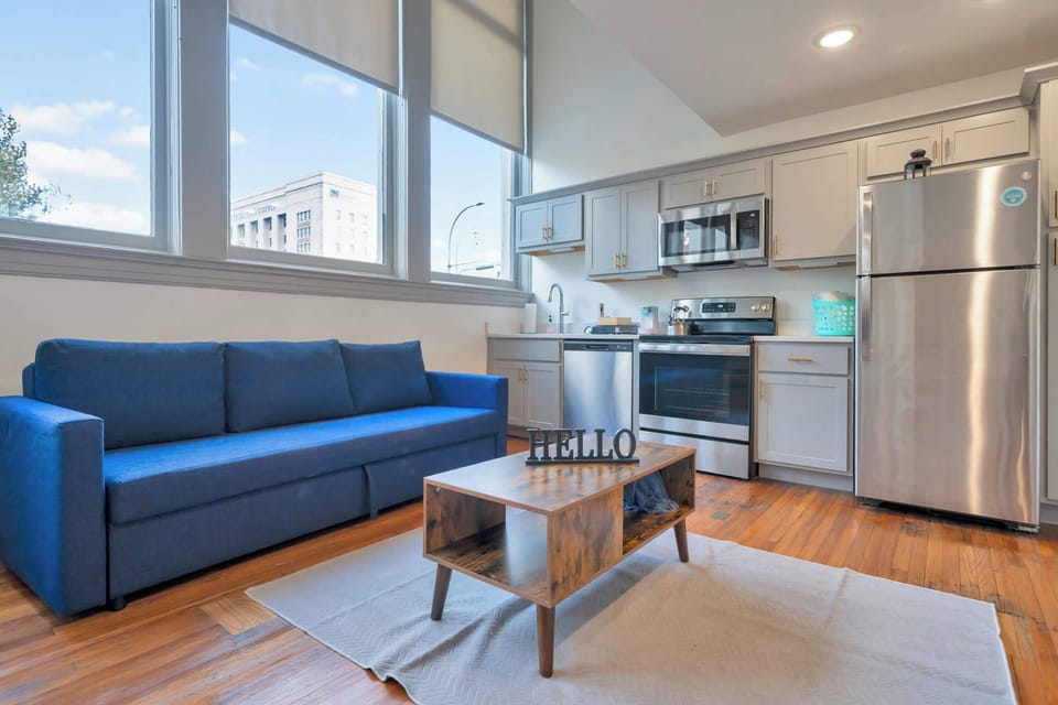 Living Room: Bright and airy living area, perfect for unwinding after a long day!