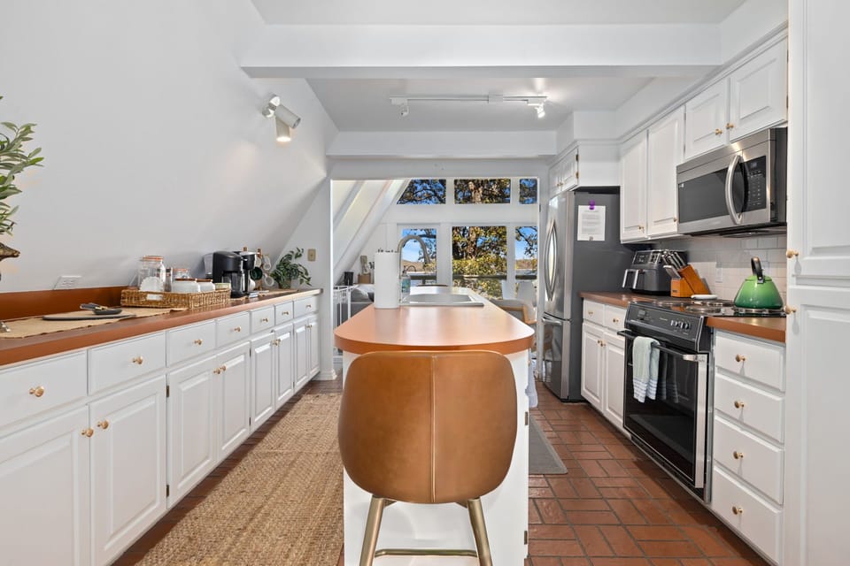 Whip up delicious meals in the galley kitchen with all the essentials you need.