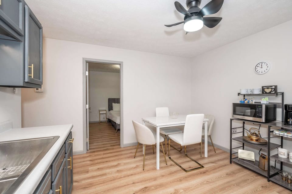 Gather for meals together at the kitchen table, with seating for 4