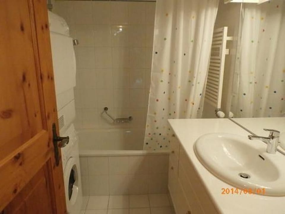 Bathroom, toilet, washing machine and dryer