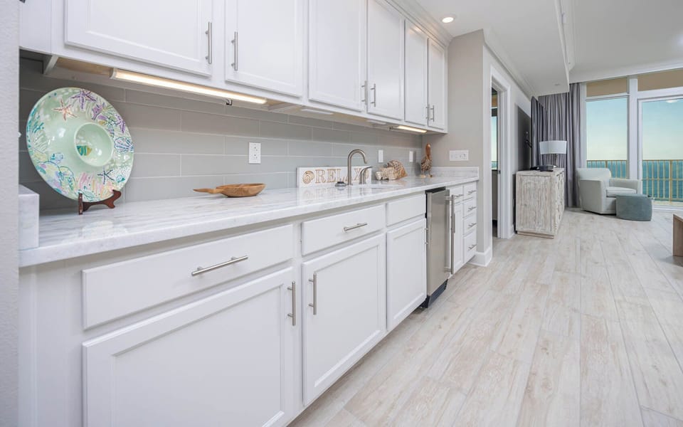 Grab a chilled drink from the fridge or create your favorite cocktail at the wet bar