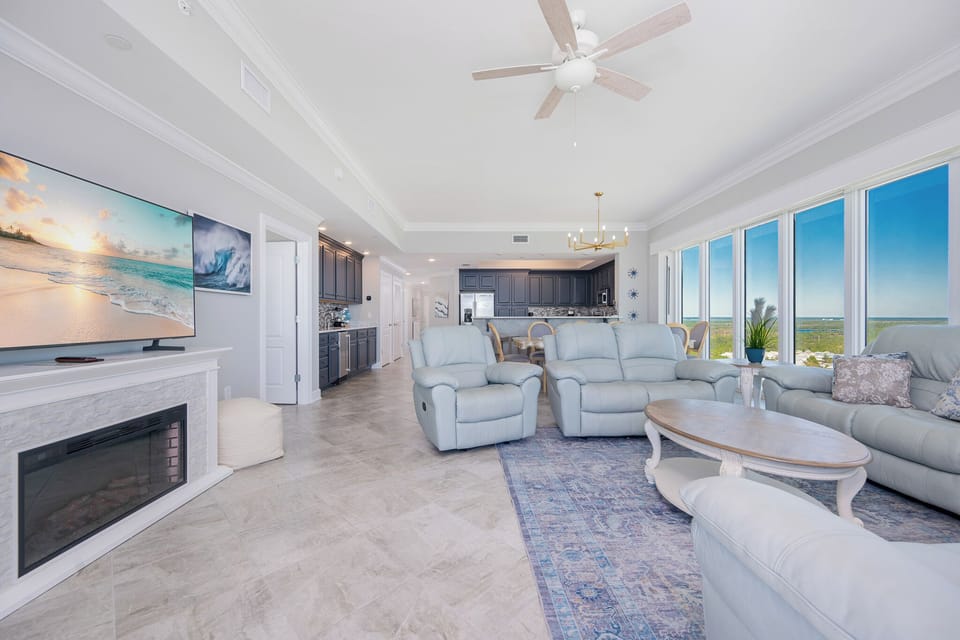 Settle into an armchair by the fireplace, stream a movie, and take in gulf views through panoramic windows