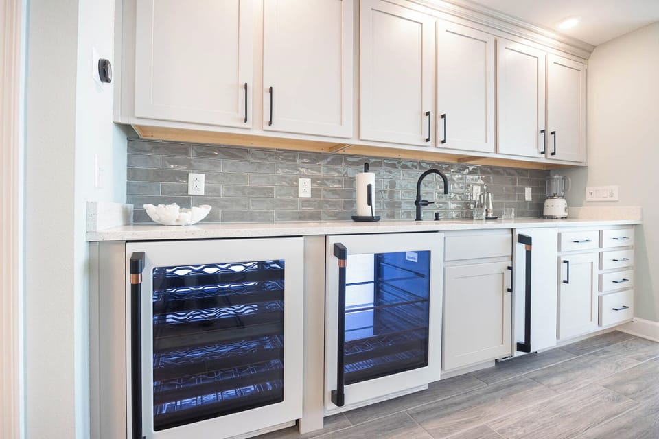 Pick a chilled bottle to enjoy from this elegant wet bar choice of wine cookers or create your favorite cocktail 