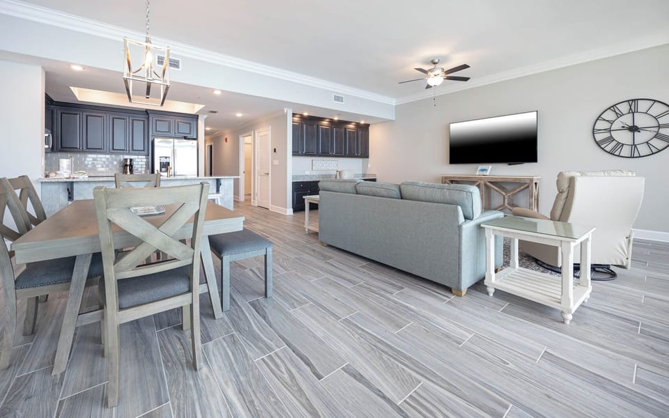 Gather in this welcoming living space and enjoy stunning beach views through the windows