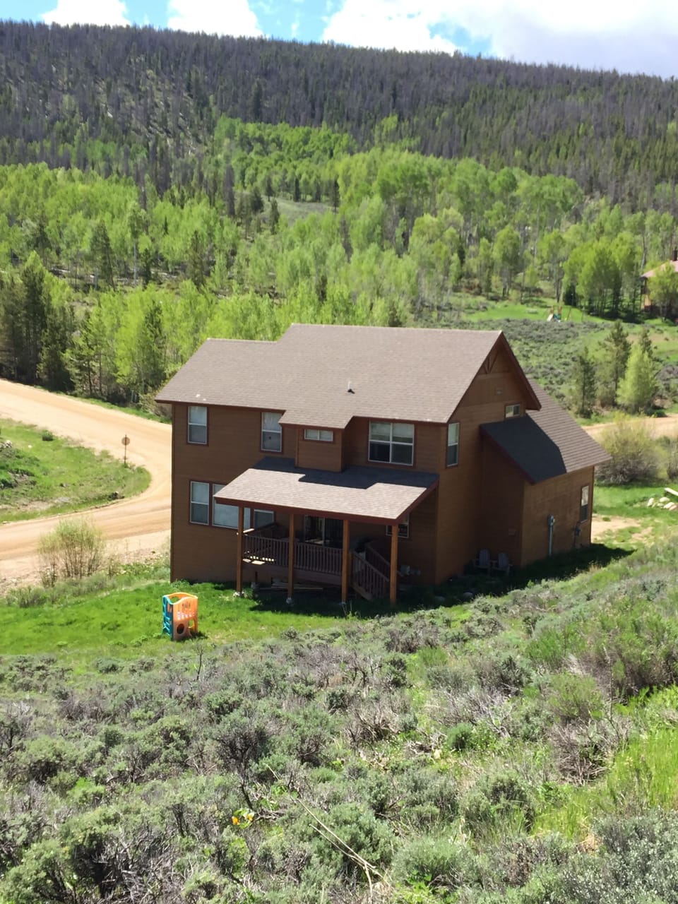 Back of house showing covered deck