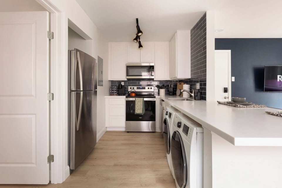 Newly renovated kitchen with brand new appliances including washer & dryer
