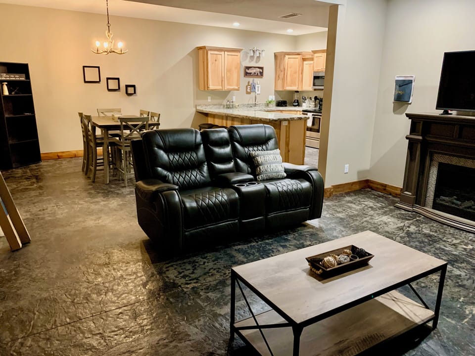 Comfortable living room with plenty of space to unwind and a smart TV.