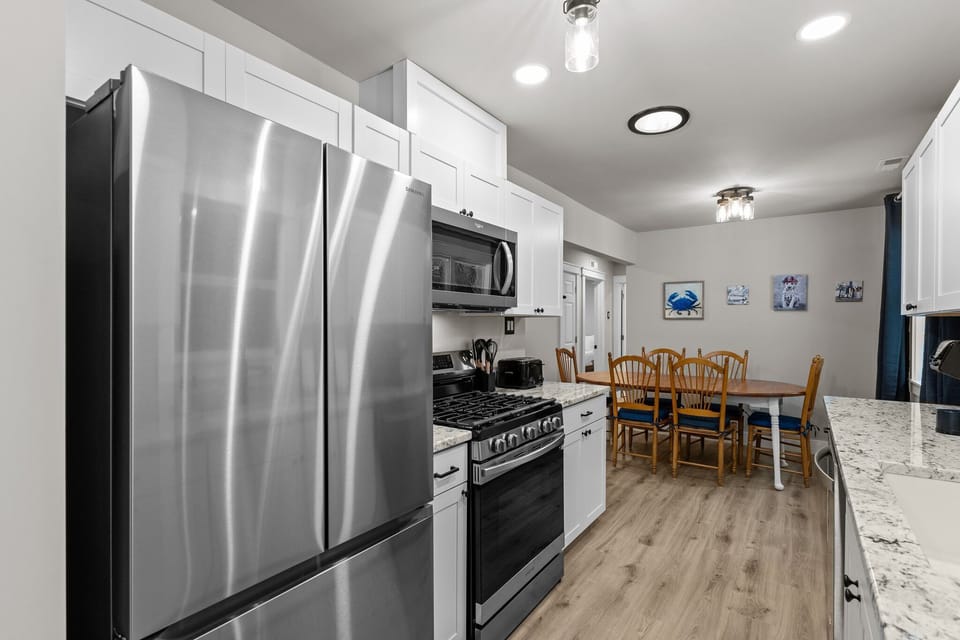 Modern kitchen featuring a stainless steel fridge for all your needs!