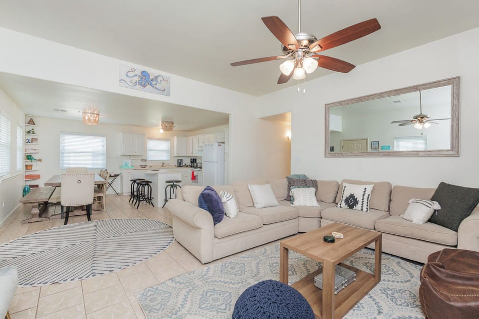 The living and dining areas have room for your entire group