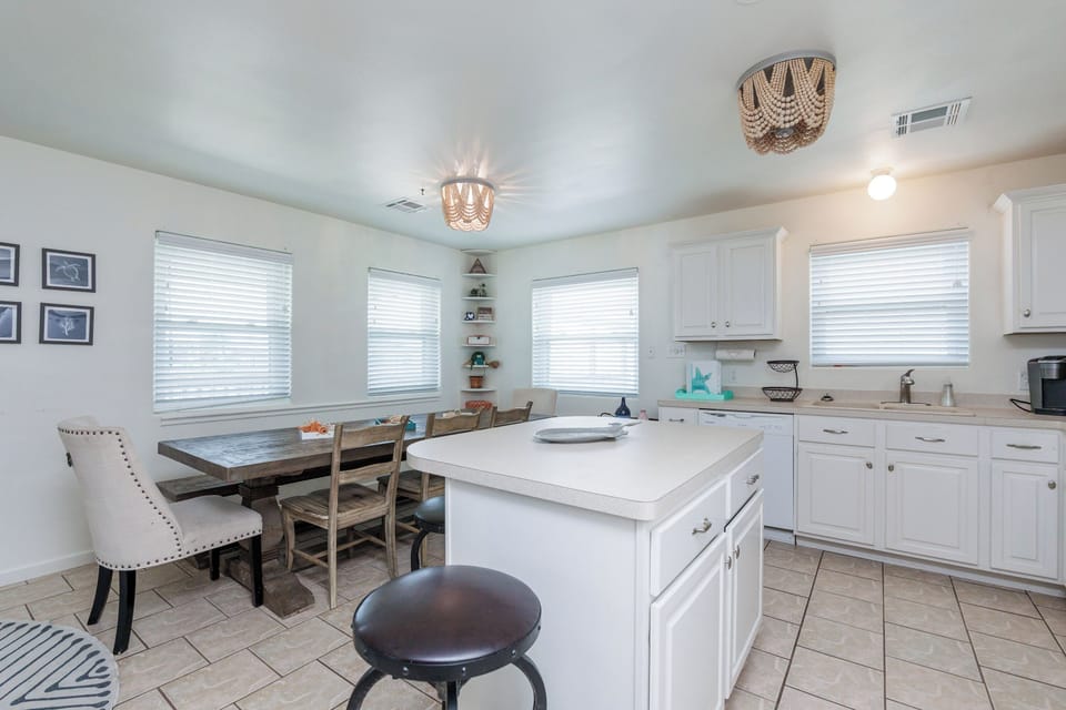 The kitchen has a lot of prep space and storage