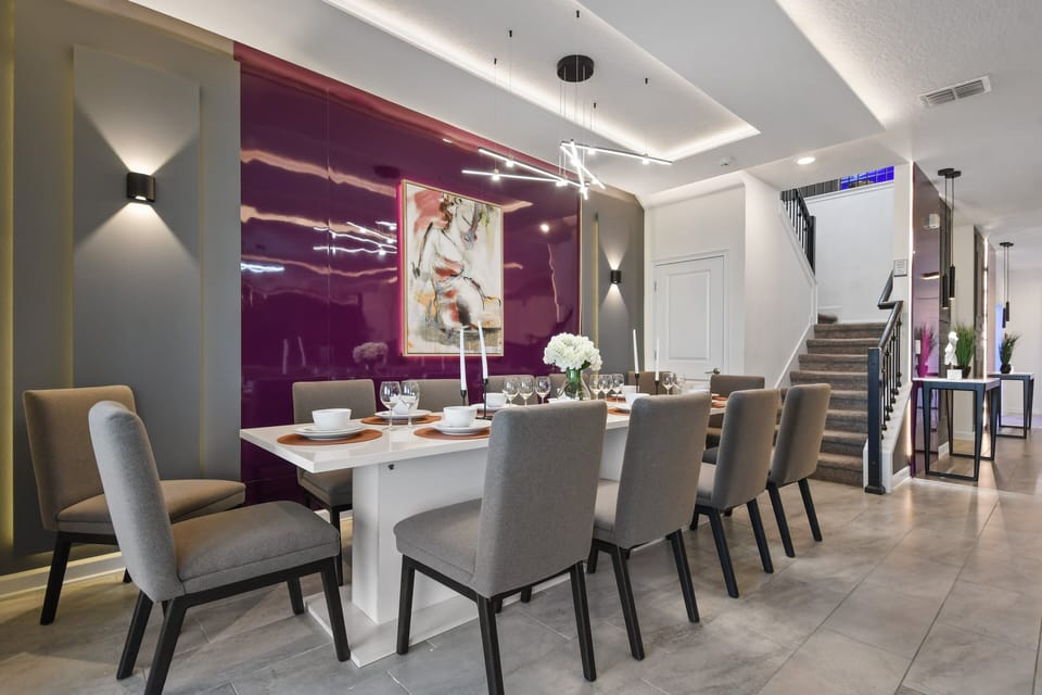 Dine in elegance in this stunning modern space with bold art and patio views!