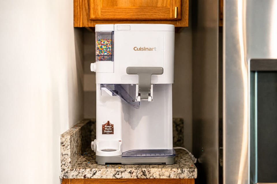 Fun kitchen perk: countertop ice cream maker with toppings station