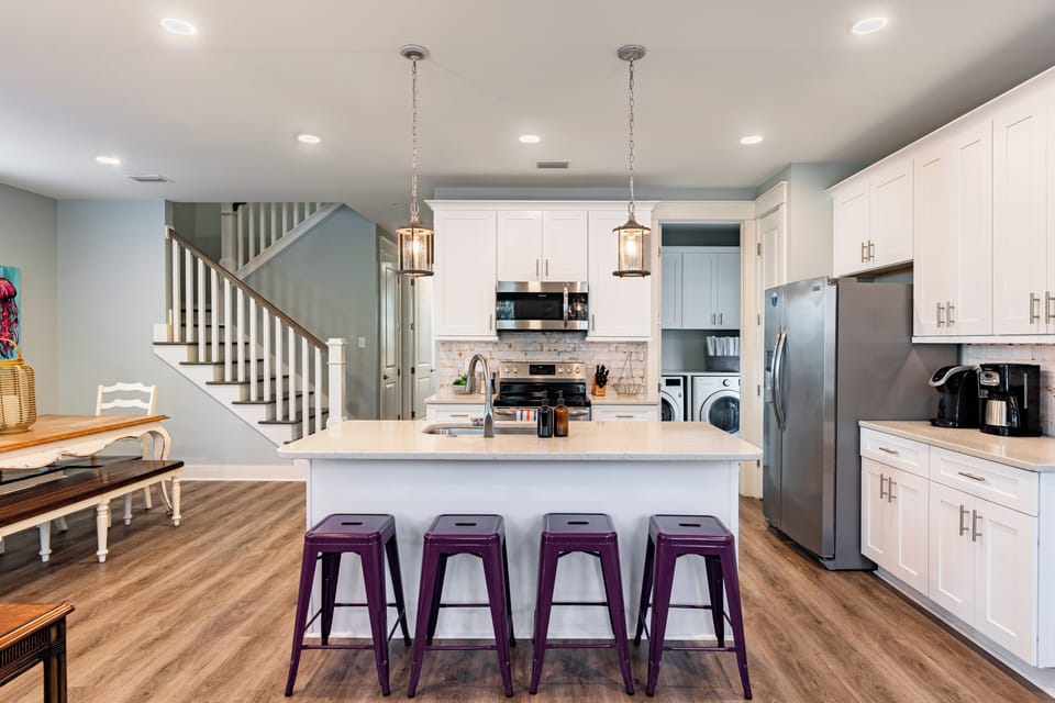 Sleek kitchen with barstool seating.