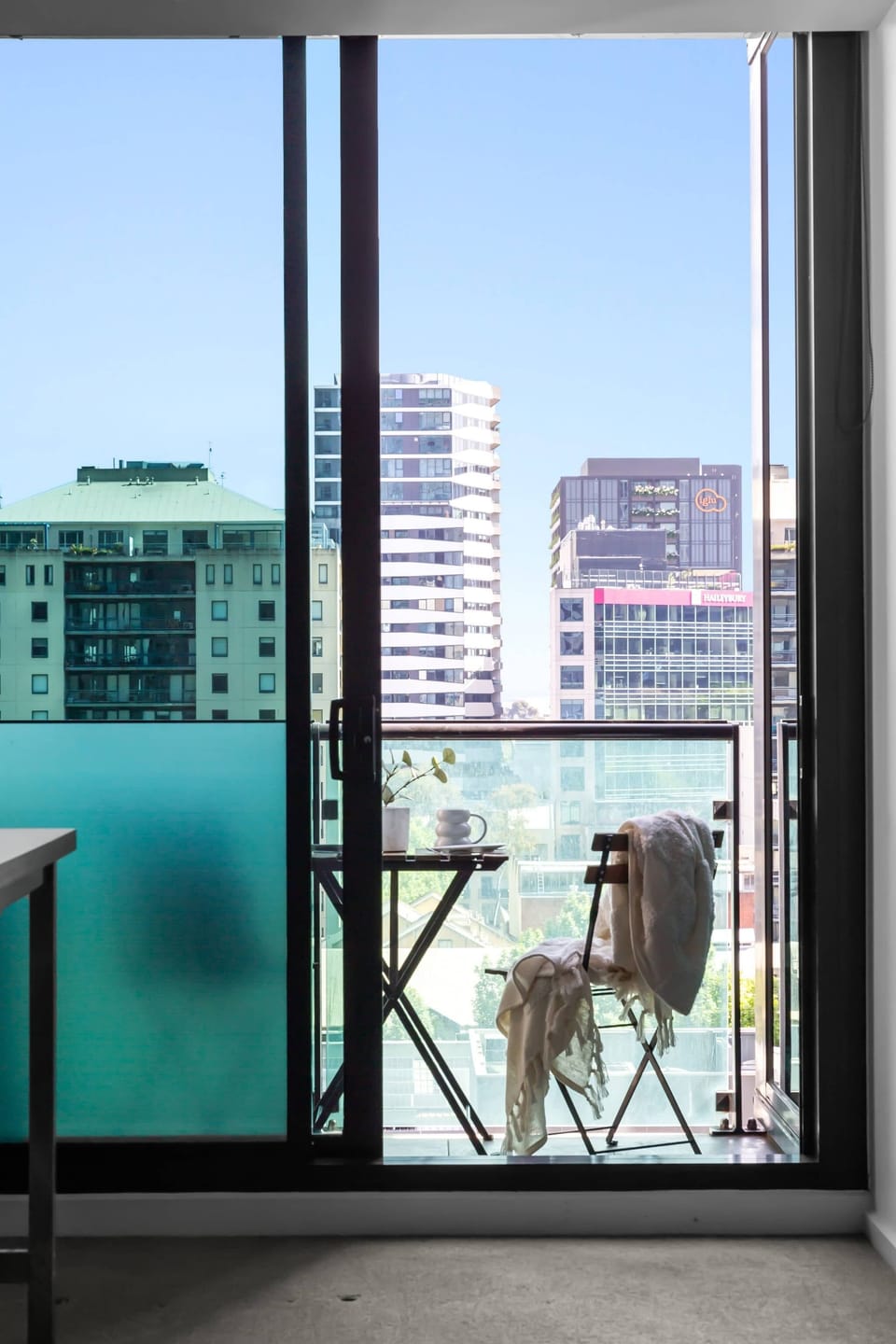 Enjoy city views from the balcony.