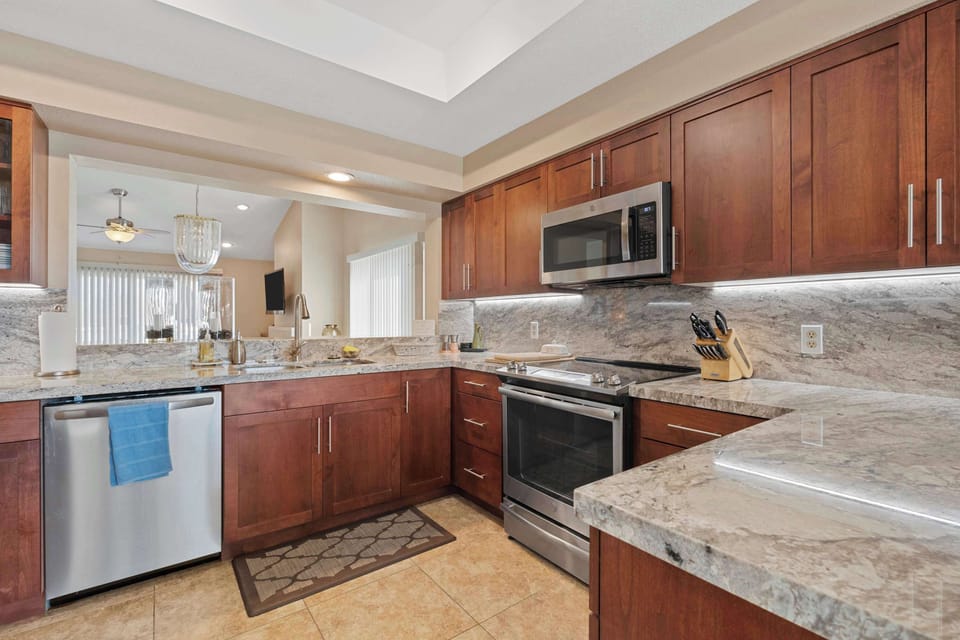The warm, inviting kitchen offers ample space & every home comfort