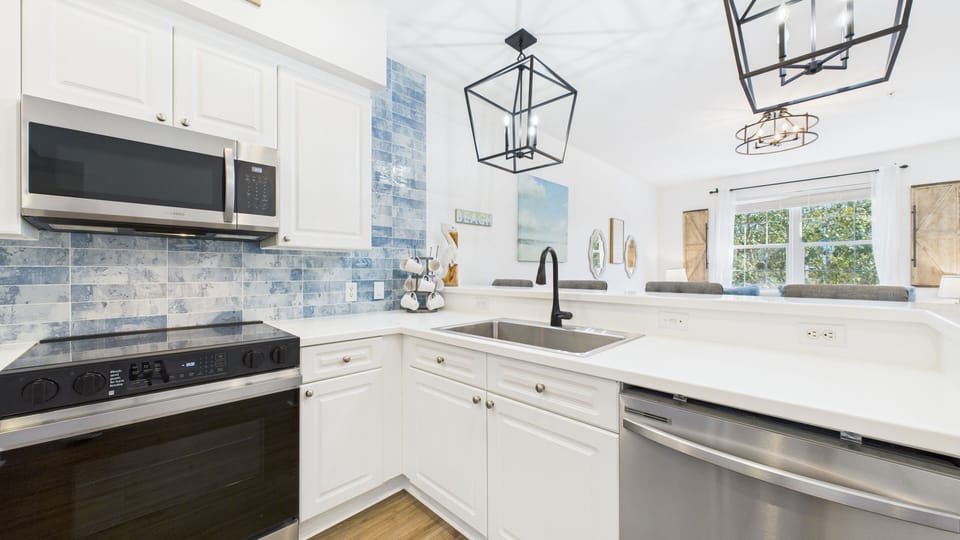Full kitchen with stainless appliances and all the cooking essentials