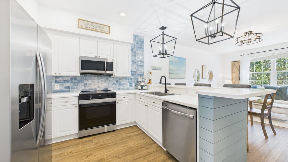 Full kitchen with stainless appliances and all the cooking essentials