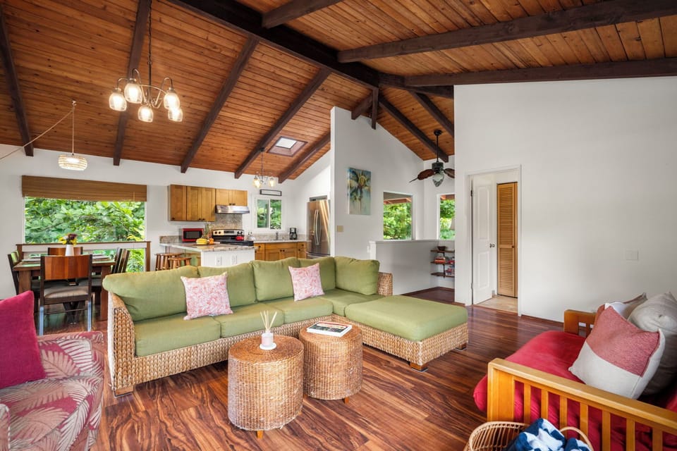 With the living room, dining room and kitchen