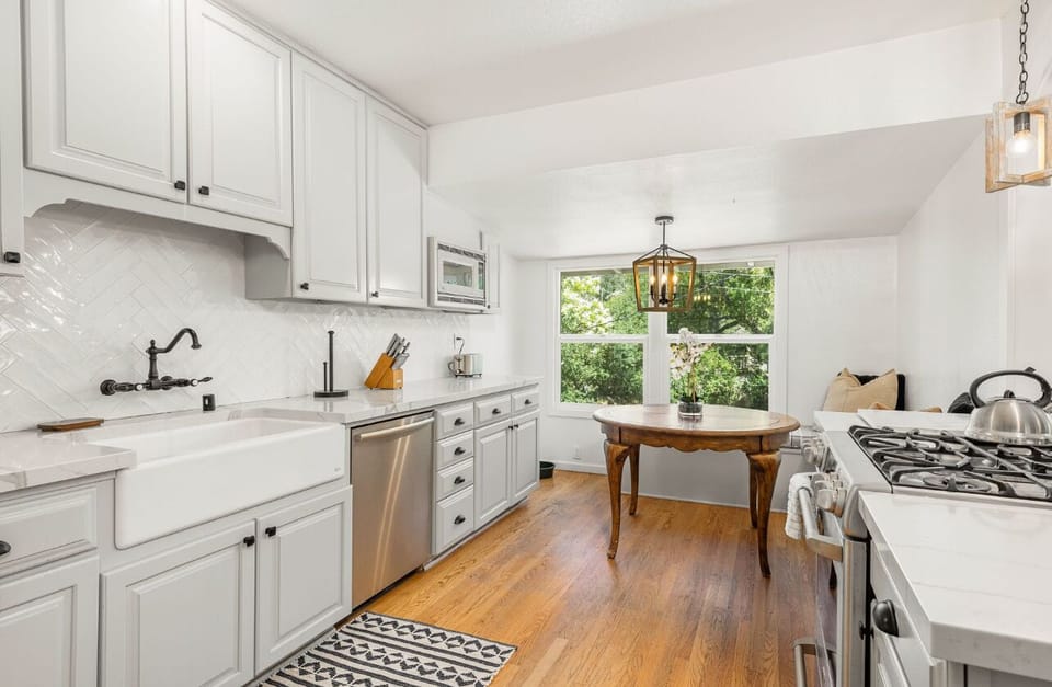 Whip up gourmet meals or quick snacks with ease  in this well-equipped kitchen.