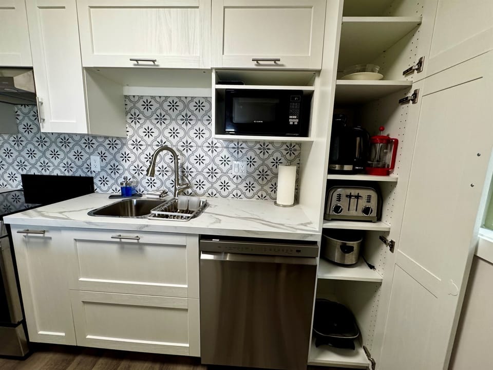 larger toaster, French press, carafe, slow cooker, electric fry pan, microwave, dishwasher (very few units offer a dishwasher)