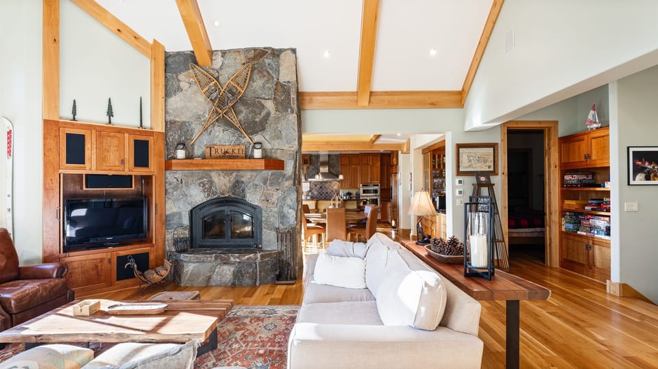 Cozy up next to the wood burning fireplace after a day on the mountain.